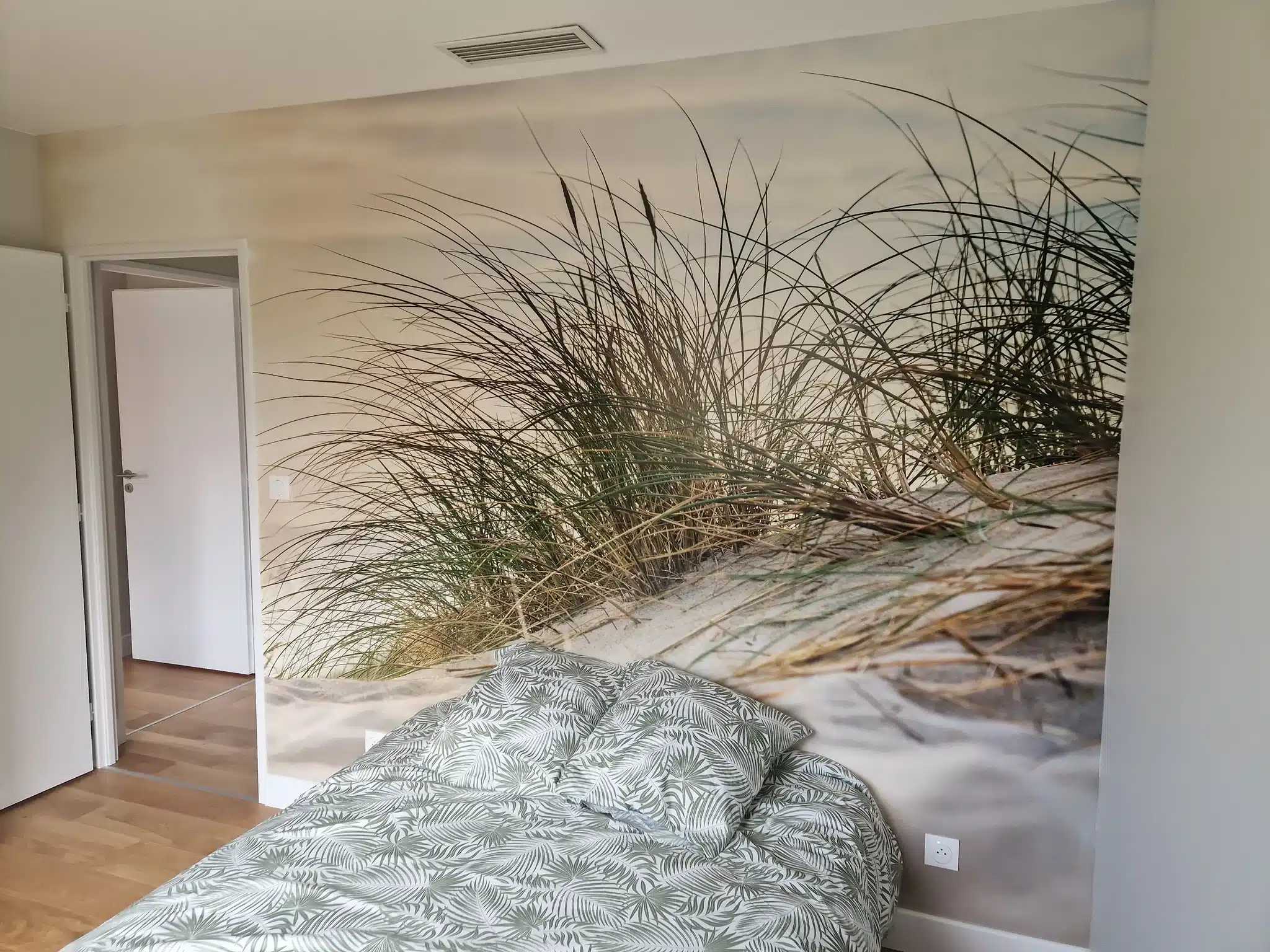 Papier peint panoramique dune et oyats dans une chambre
